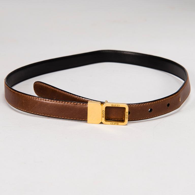 GUCCI Silk Blouse and a Leather Belt.