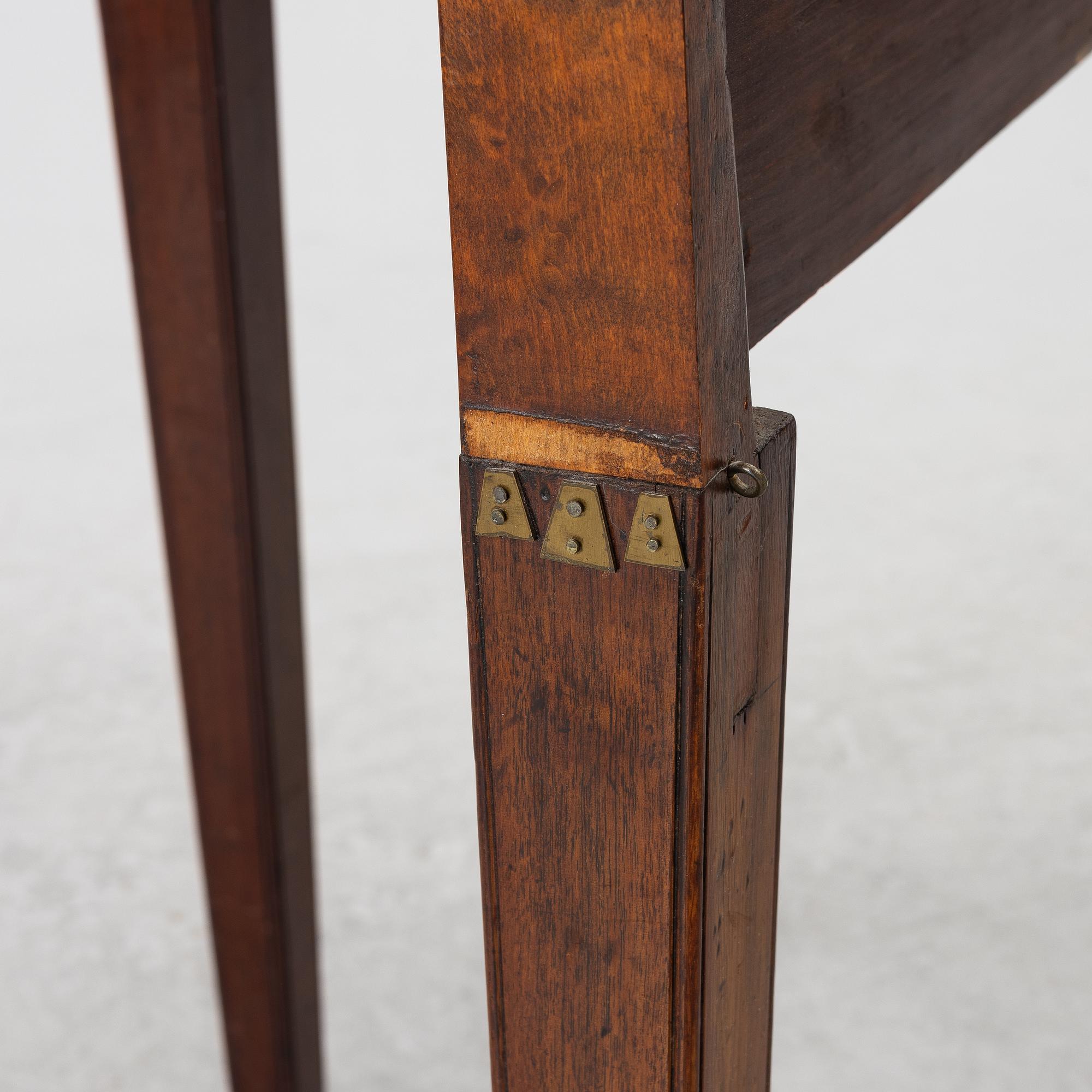 A late Gustavian mahogany games table, 18th century.