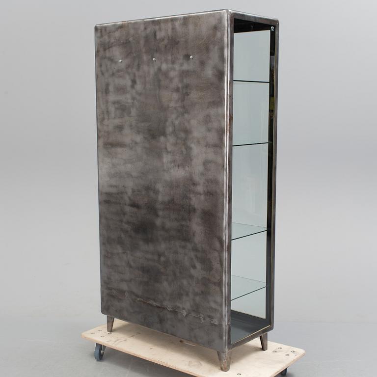 A glazed cabinet, second half of the 20th Century.