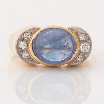 Cabochon cut sapphire and eight cut diamond ring.