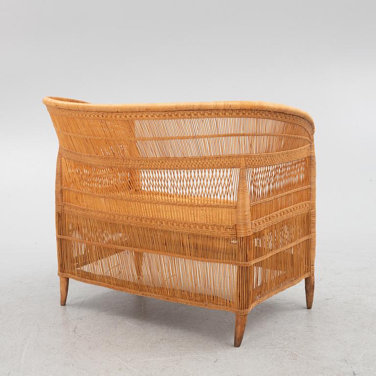 A rattan sofa and a pair of armchairs, second half of the 20th century.