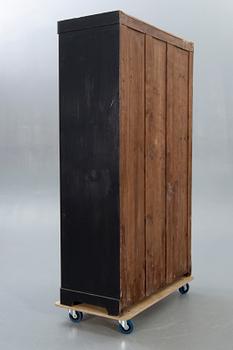 A display cabinet early 1900s.