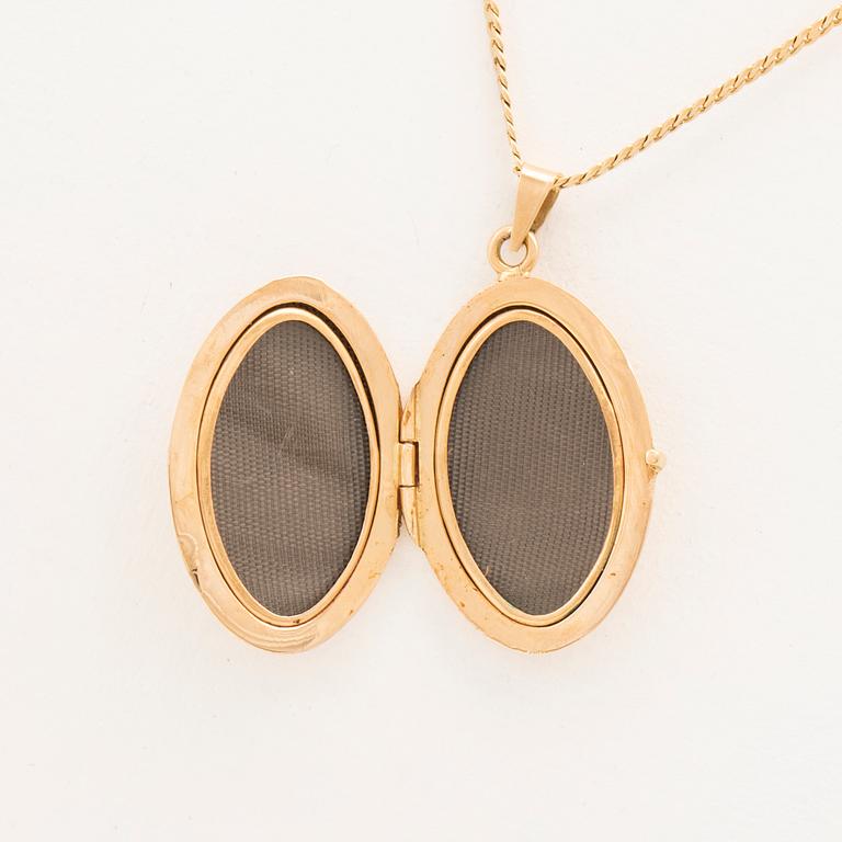 Halsband med berlock 18K guld.