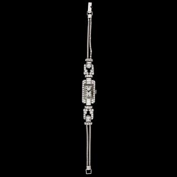 A diamond ladie's wrist watch, tot. app. 4 cts.