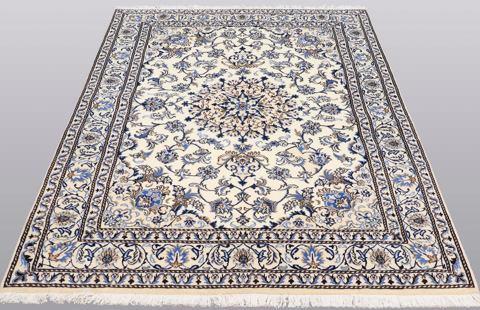 A rug, Nain part silk, ca 235 x 160 cm.
