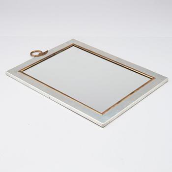 Josef Frank, a pewter and brass wall mirror, Svenskt Tenn, Stockholm 1952.