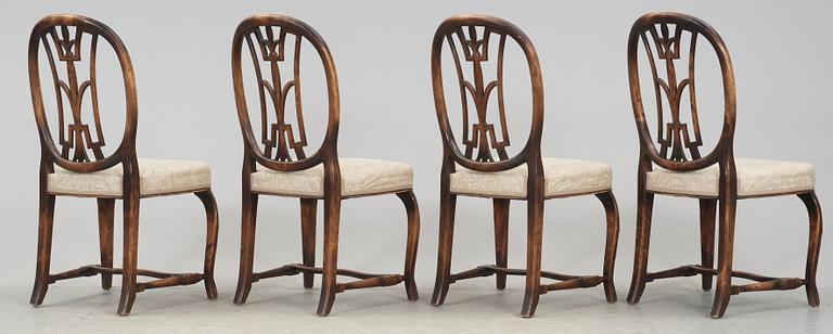 An Axel Einar Hjorth set of 4 Swedish Grace chairs and a pair of armchairs, 'Östanå', Nordiska Kompaniet, 1929.