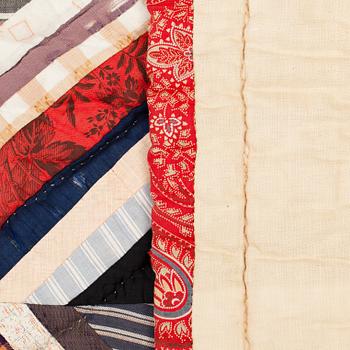 A QUILTED PATCHWORK BED COVER, Sweden first half of the 20th century, ca 191 x 139 cm.