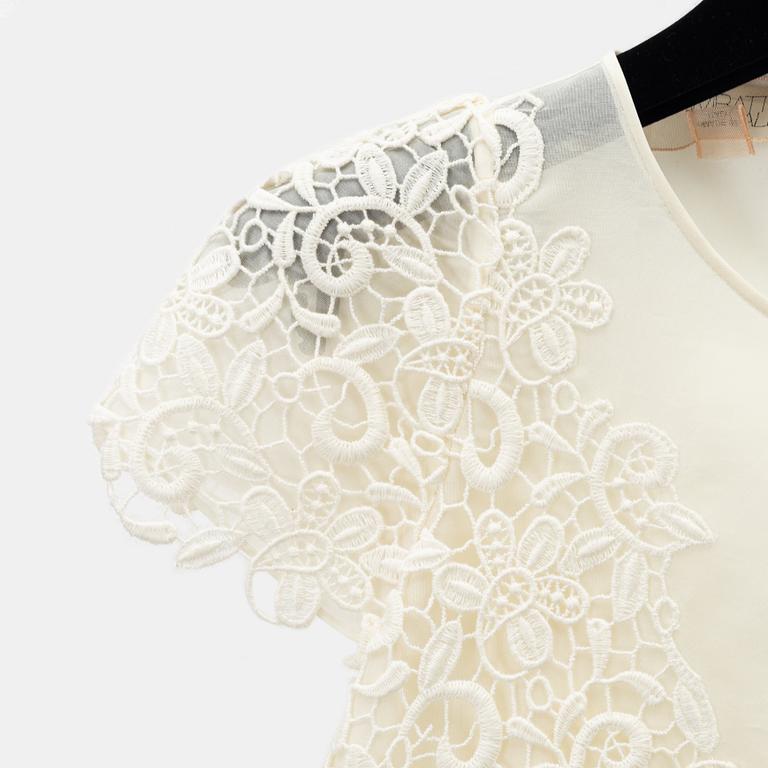 Giambattista Valli, a cotton and silk lace top, size 40/XS.