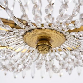 A Swedish late Empire gilt brass nine-light chandelier, 1830's.