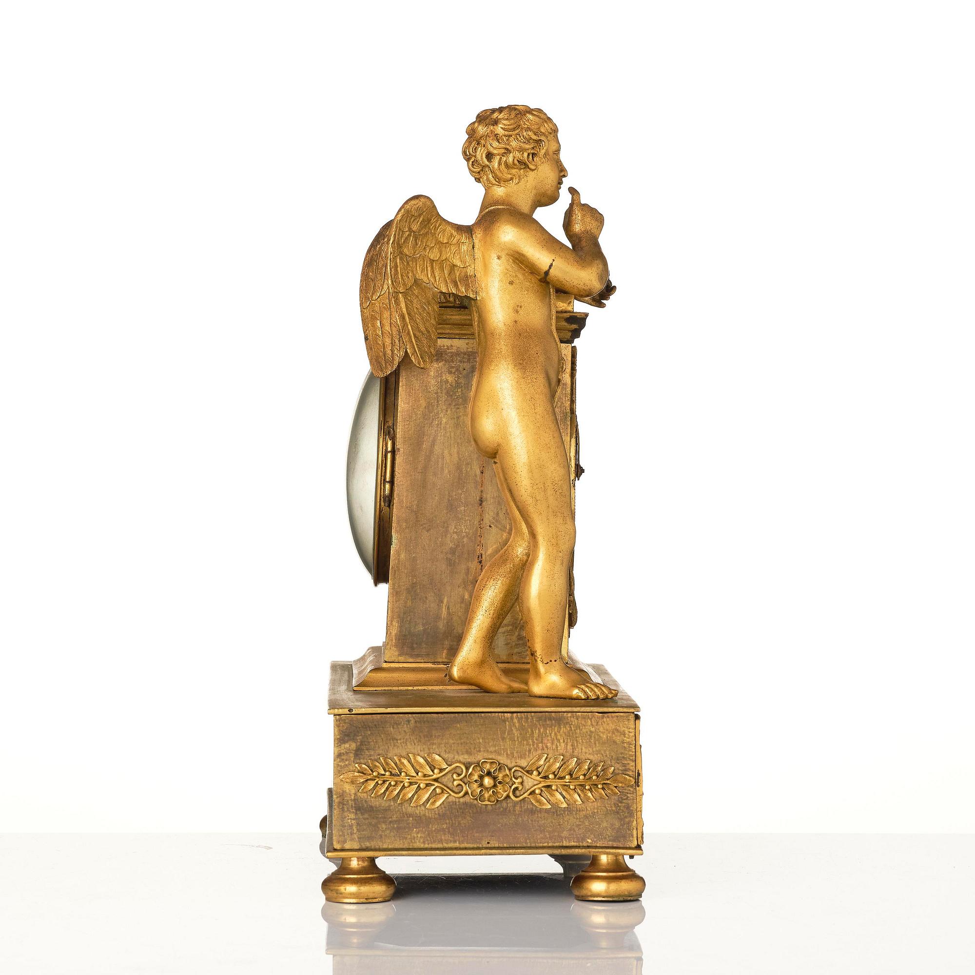 A French Empire ormolu mantel clock, early 19th century.