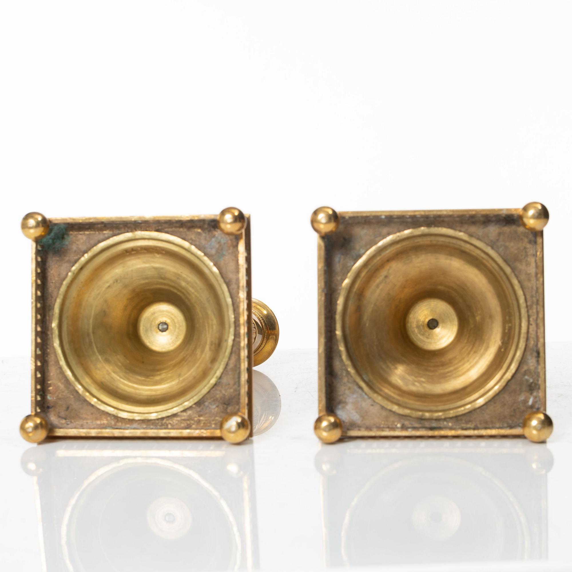 Ljusstakar, ett par, mässing, modell nr 71, Skultuna Messingsbruk, 1900-talets första hälft.