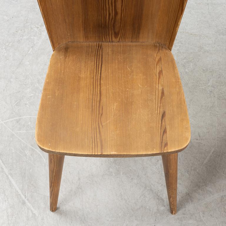 Göran Malmvall, a set of four pine chairs and a rocking chair, Svensk Fur, mid 20th Century.