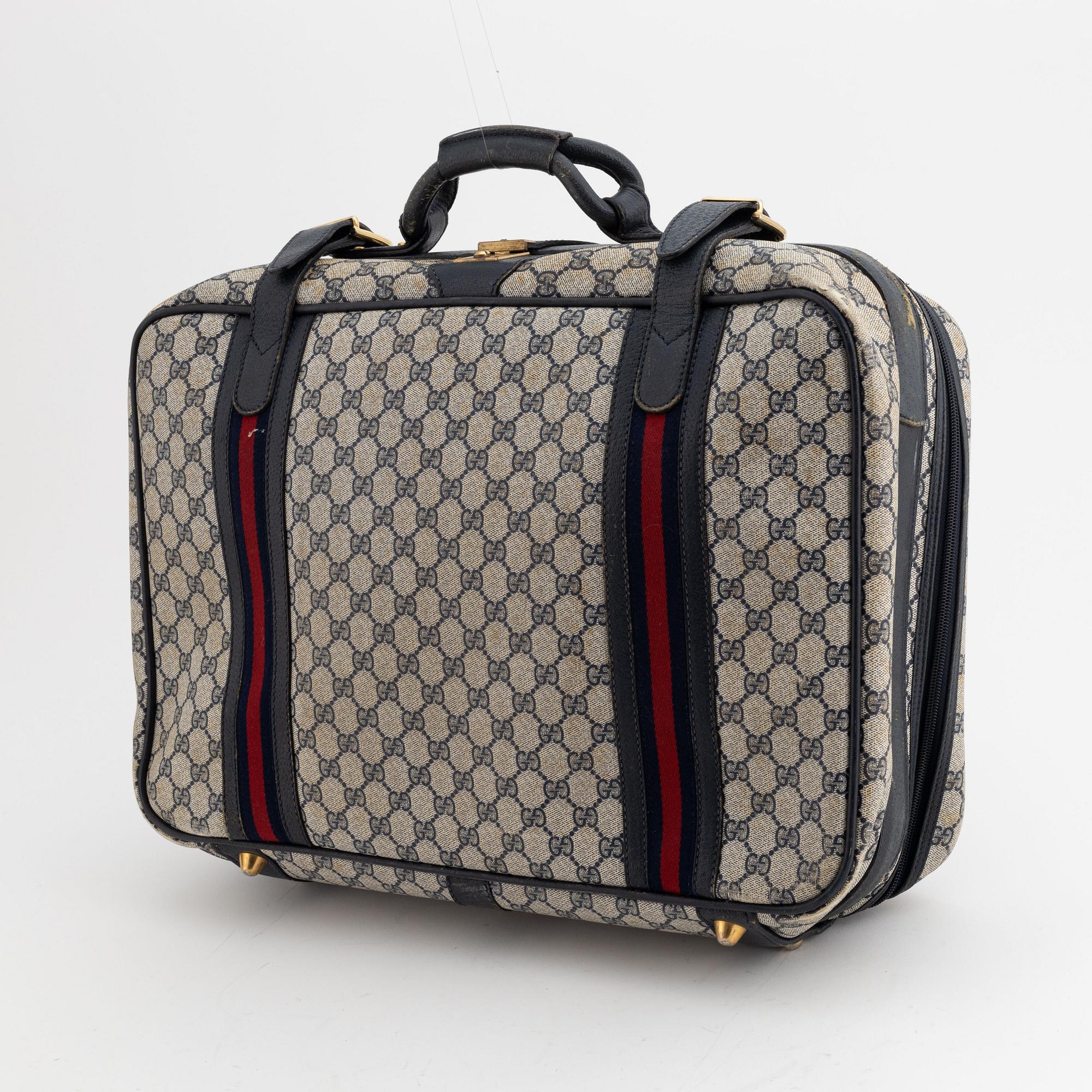 Gucci, resväska.