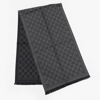 Gucci, a wool 'GG Jaquard Knitted Scarf'.