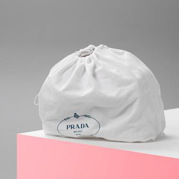 A leather handbag by Prada.