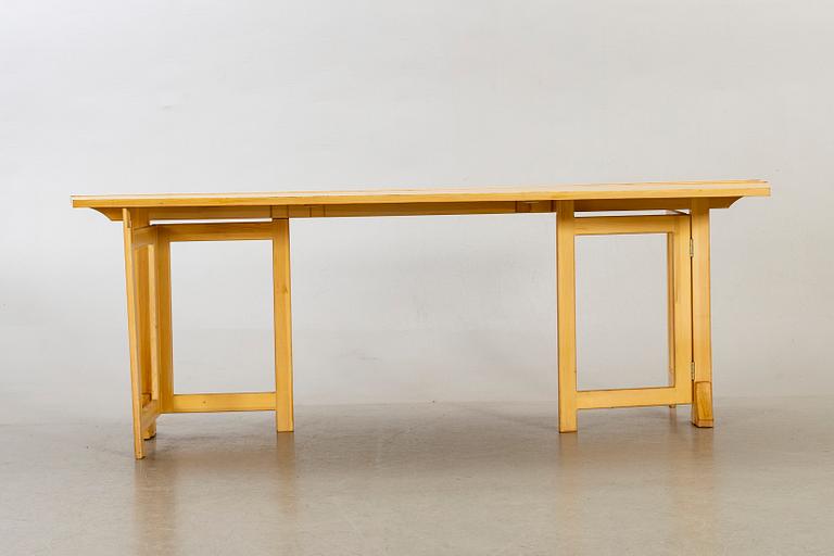 A pine wood gated leg table, design by Olof Pira "Sold Form".