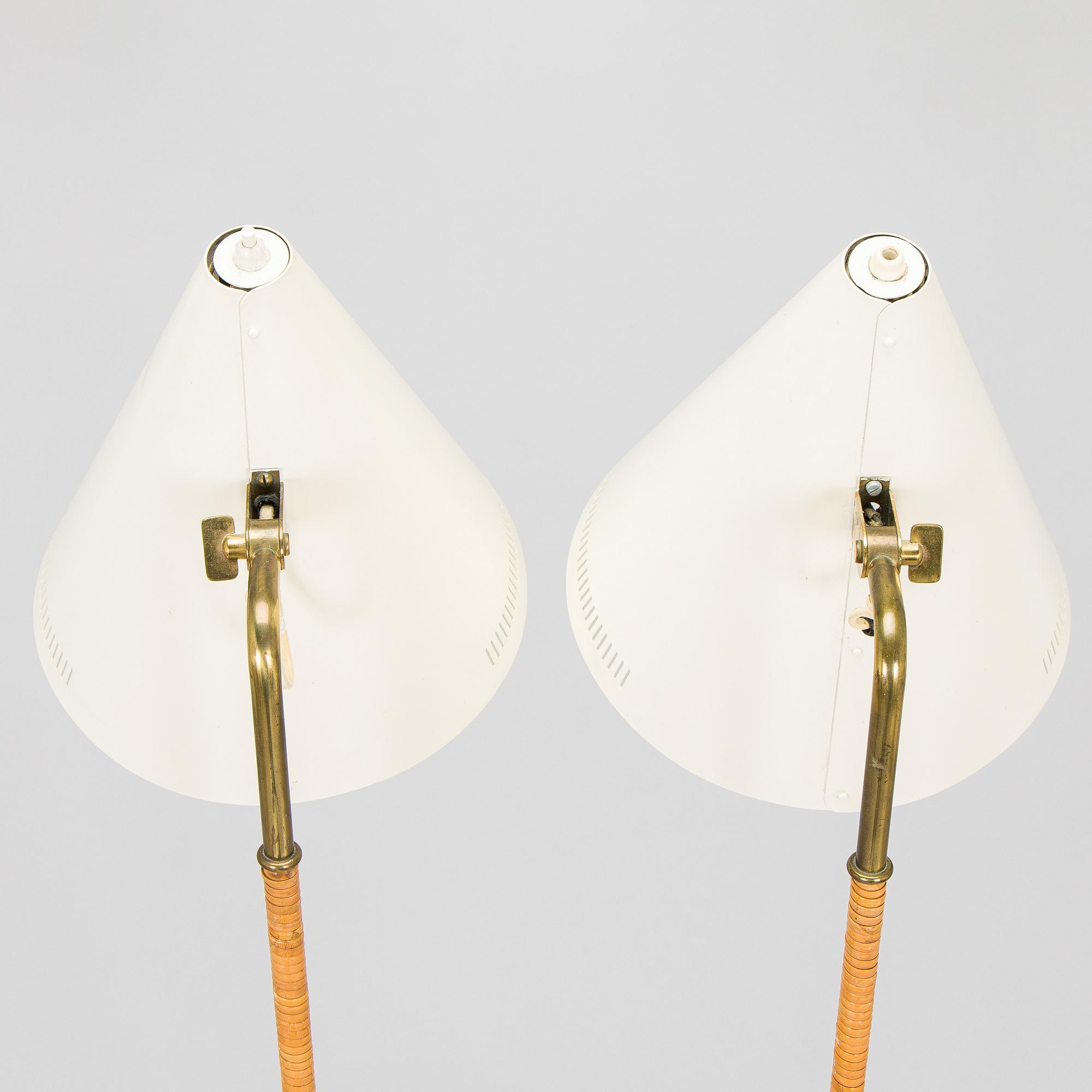 Paavo Tynell, a pair of mid-20th century K10-10 floor lamps for Taito Finland.