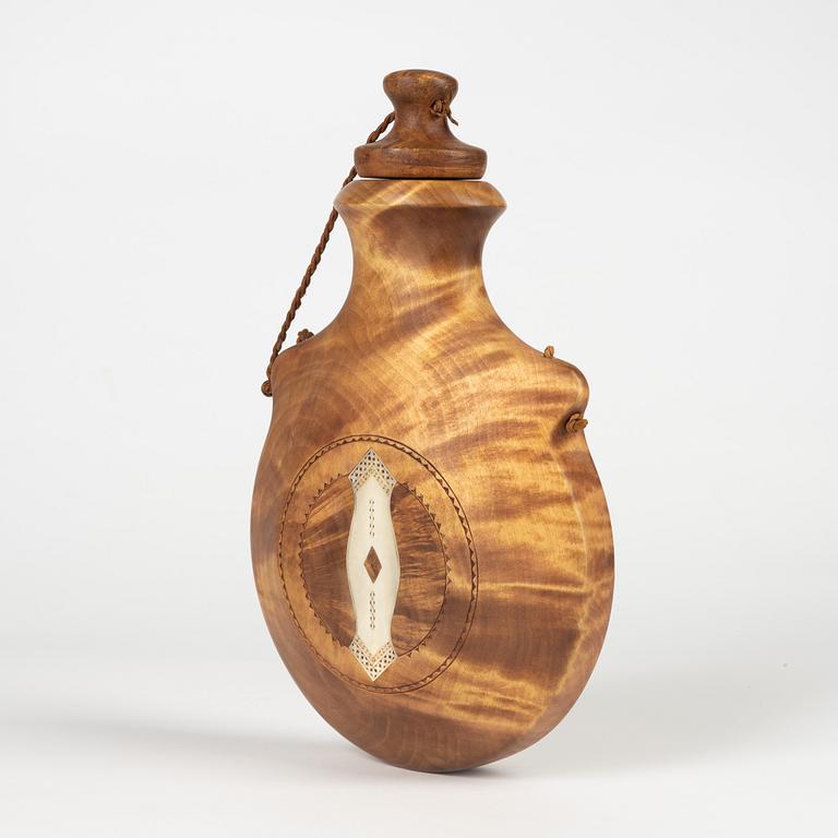 A birch flask by Erik Svonni, signed and dated 1975.