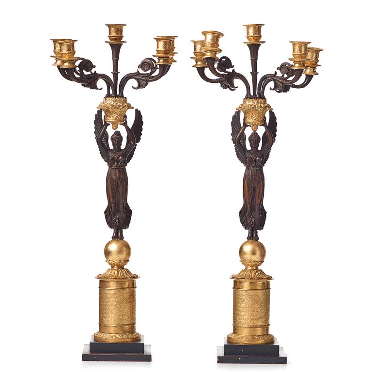 A pair of Empire early 19th century five-light candelabra by Pierre Chibout.