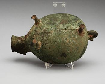 An archaistic tripod bronze vessel.