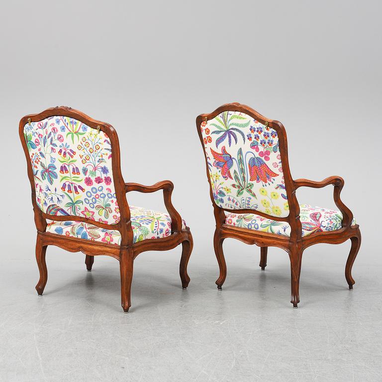 Two 18th century French Louis XV walnut armchairs.