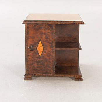 A 1930s birch side table.