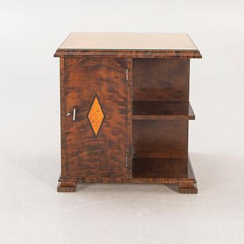 A 1930s birch side table.