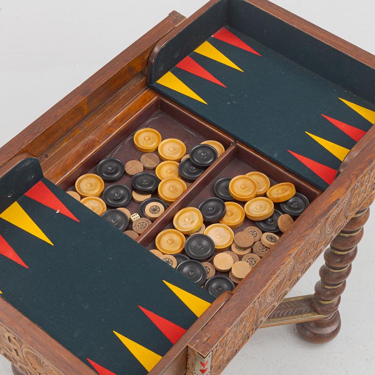 A Baroque style table with boardgames. 1900-tal.