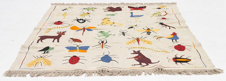 A hand-embroidered kilim rug, c. 171 x 123 cm.