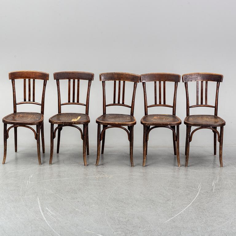 A matched set of four wooden chairs, first half of 20th Century.