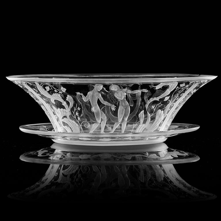 Simon Gate, a Swedish Grace engraved glass bowl with stand, Orrefors 1930, model 147, engraved by Karl Rössler.