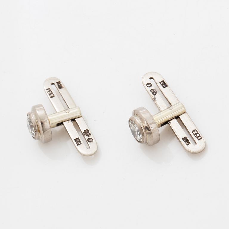 Brilliant-cut diamond shirt buttons.