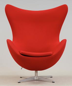 An Arne Jacobsen red fabric 'Egg' chair, Fritz Hansen, Denmark 2002.