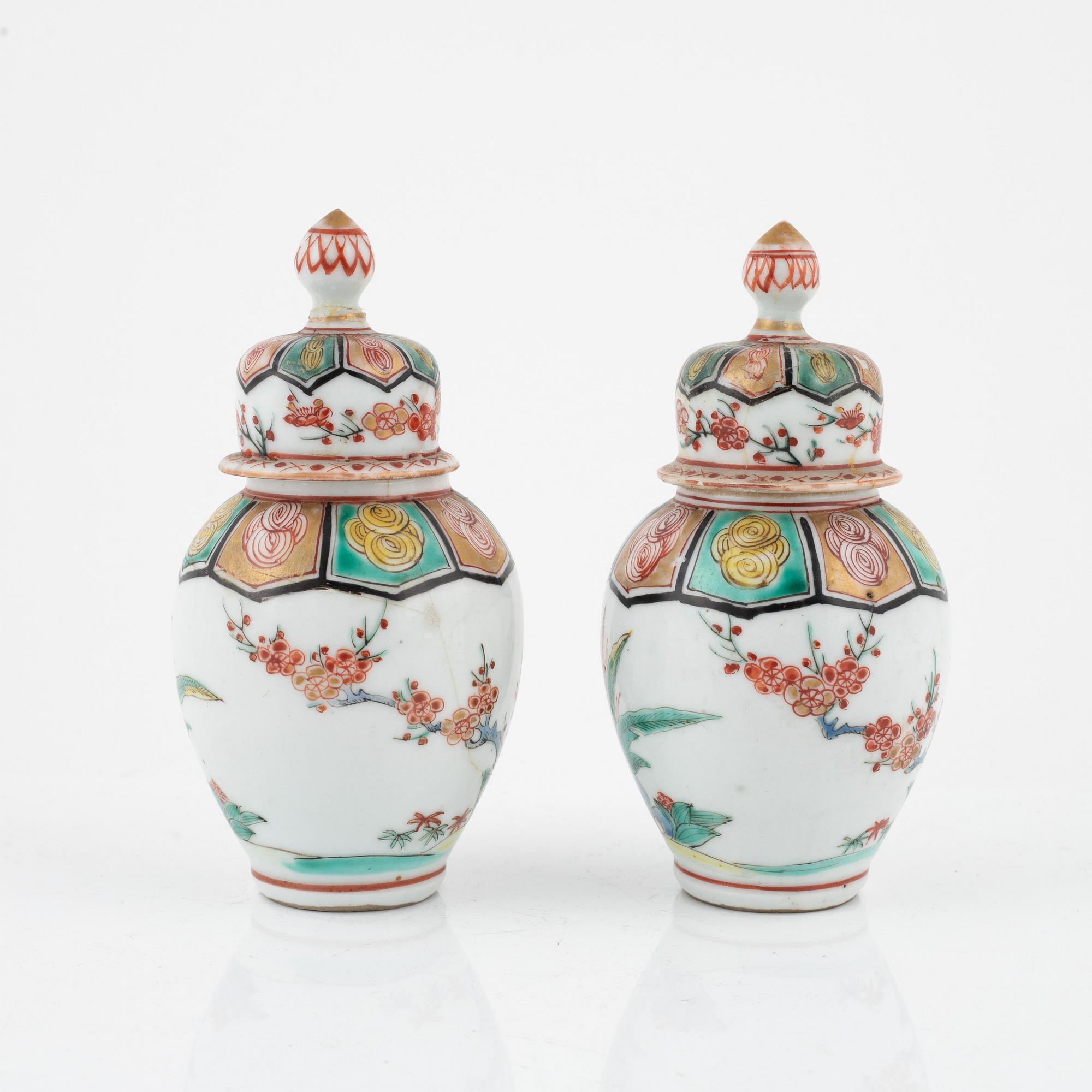 A pair of Japanese jars with covers, circa 1900.