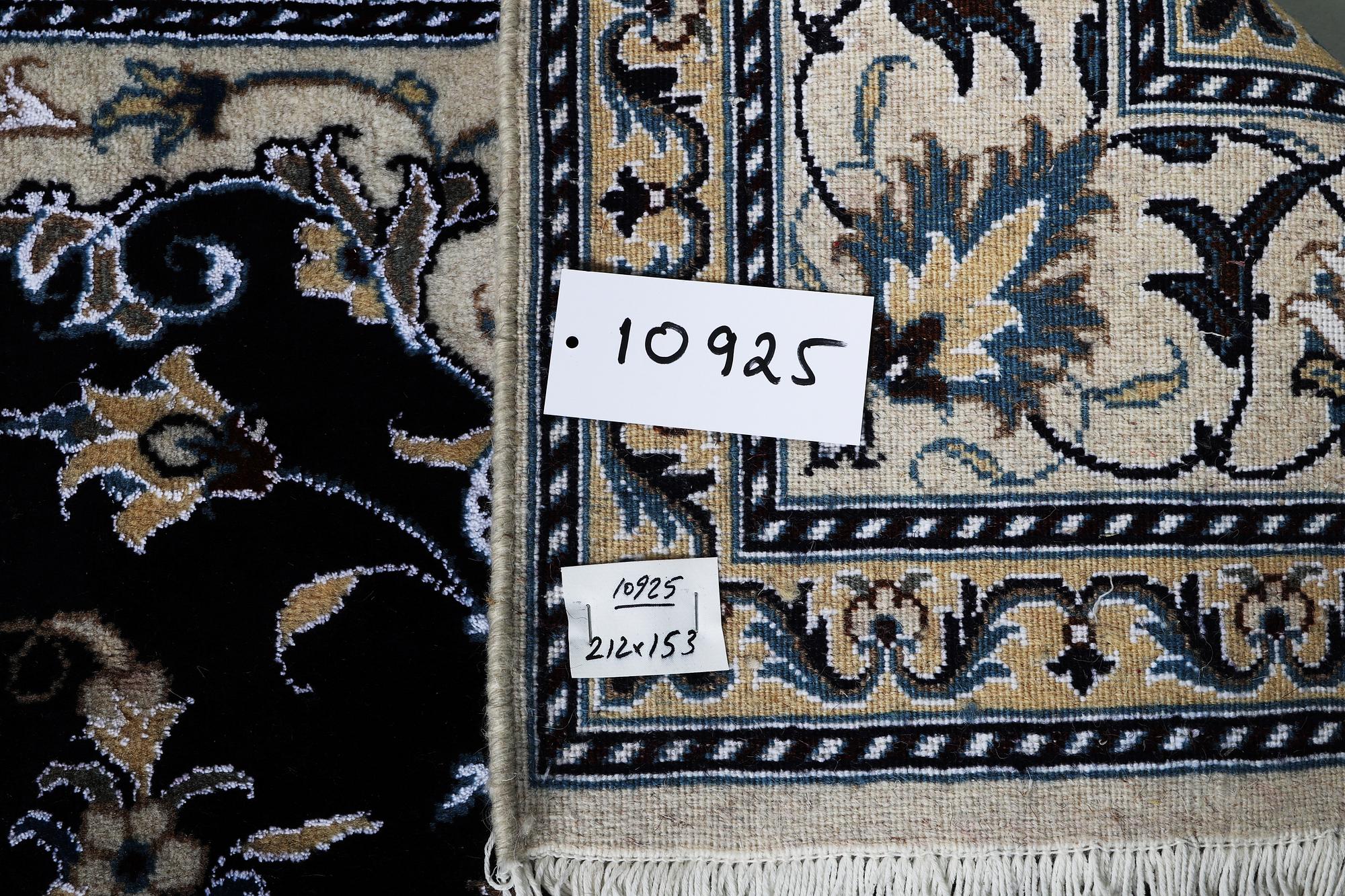 A carpet, Nain, part silk, ca 212 x 153 cm.