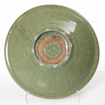 A large celadon glazed dish, Ming dynasty (1368-1644).