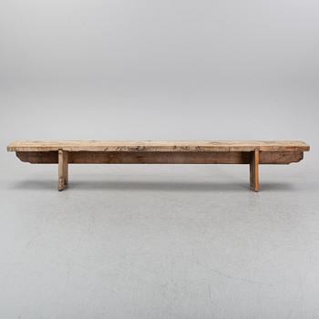 A pine bench, 19th Century.