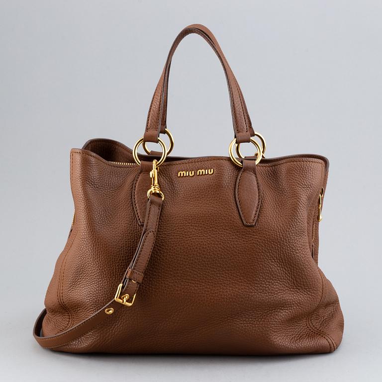 Miu Miu, a leather bag.