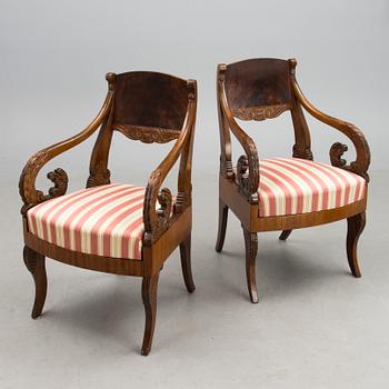 A pair of 1820-1840s Russian empire armchairs.