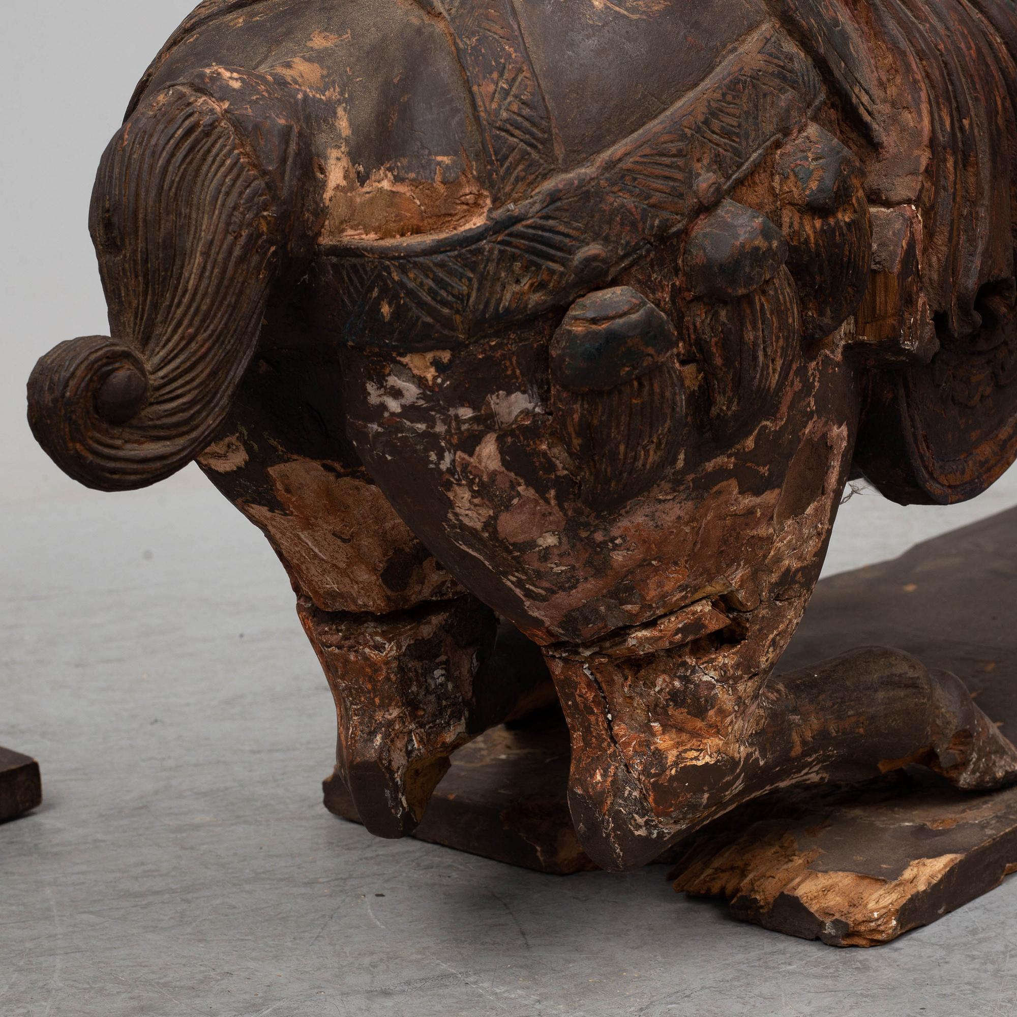 Two large wooden sculptures of horses, 20th century.