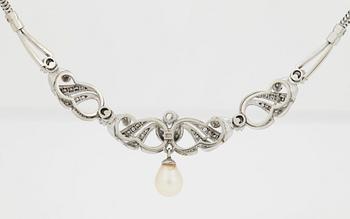 A NECKLACE set with round brilliant-cut diamonds and cultured pearls.