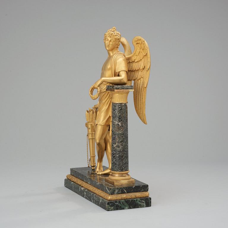 A French Empire early 19th century gilt bronze and verde antico marble table sculpture.