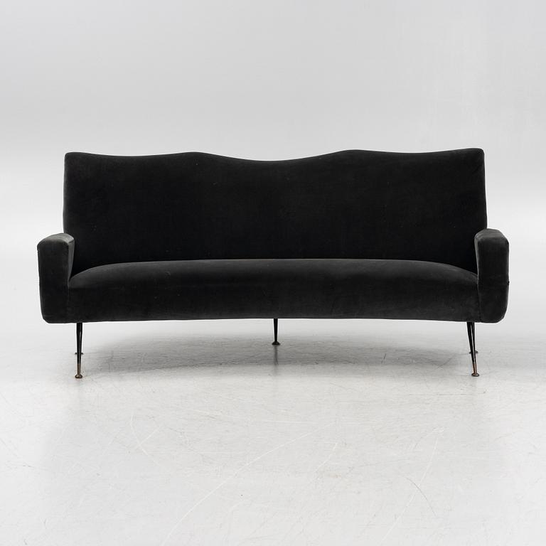 A curved sofa with velvet covering, 20th Century,