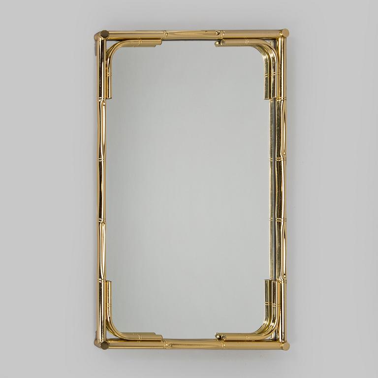 A 1970s/80s brass mirror.