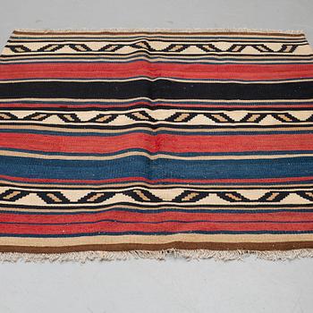 A CARPET, kilim, ca 173 x 156 cm.