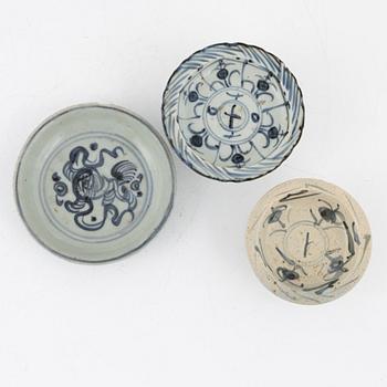 A shipwreck bowl, late Ming dynasty (1368-1644), and two bowls, South East Asia, around 1900.