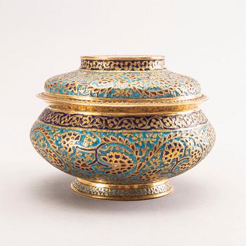 An Indian 19th century gilded jar with lid.