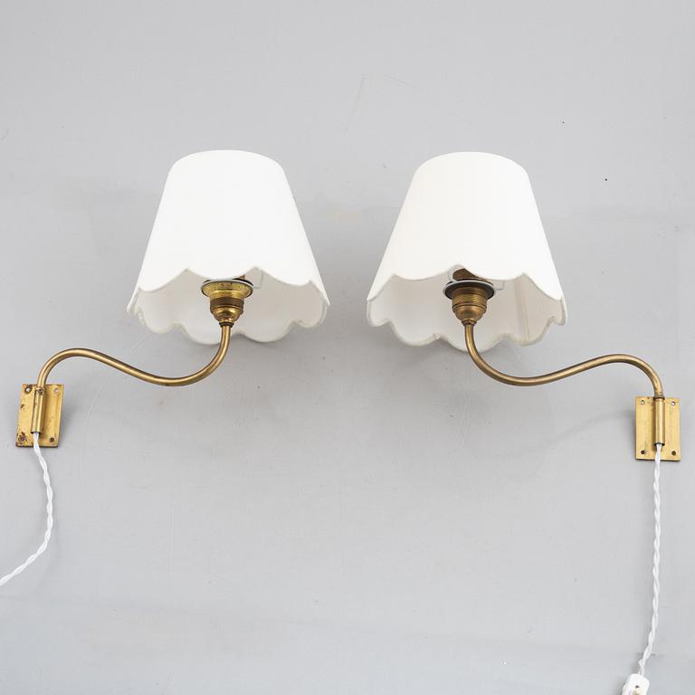 Harald Notini, a pair of model '8568' wall lamps, Arvid Böhlmarks Lampfabrik, 1940's/50's.