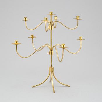 A BRASS CANDELABRUM, second half of the 20th century.